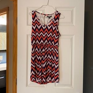 Blue, white and peach pattern romper